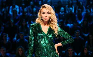 Снова беременна? Оля Полякова засветила округлившийся животик