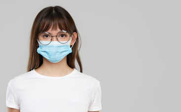 Какой стороной правильно носить маску к лицу: цветной или белой?