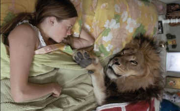 Семья в Калифорнии жила в компании диких львов и тигров: фото шокируют