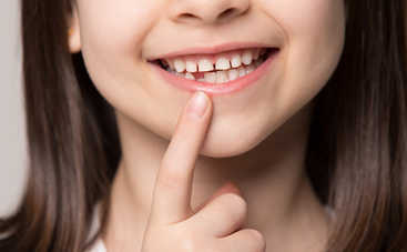 Как растут постоянные зубы у детей (таблица)