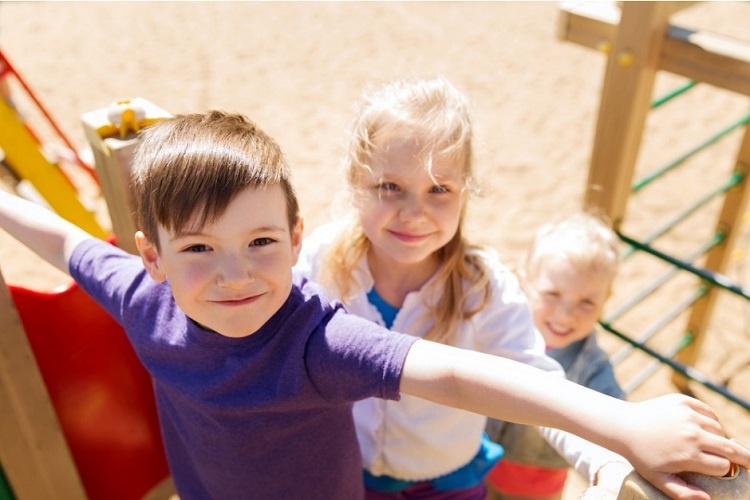 group-of-happy-kids-on-children-playground-picture-id483658696