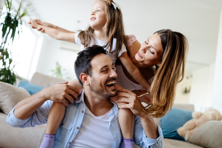 happy-family-having-fun-times-at-home-picture-id874911746